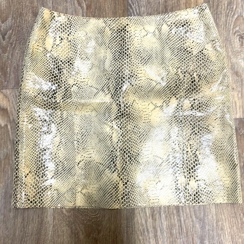 Tan and black snake skin. Leather 10% polyester lining Sz4 fully lined